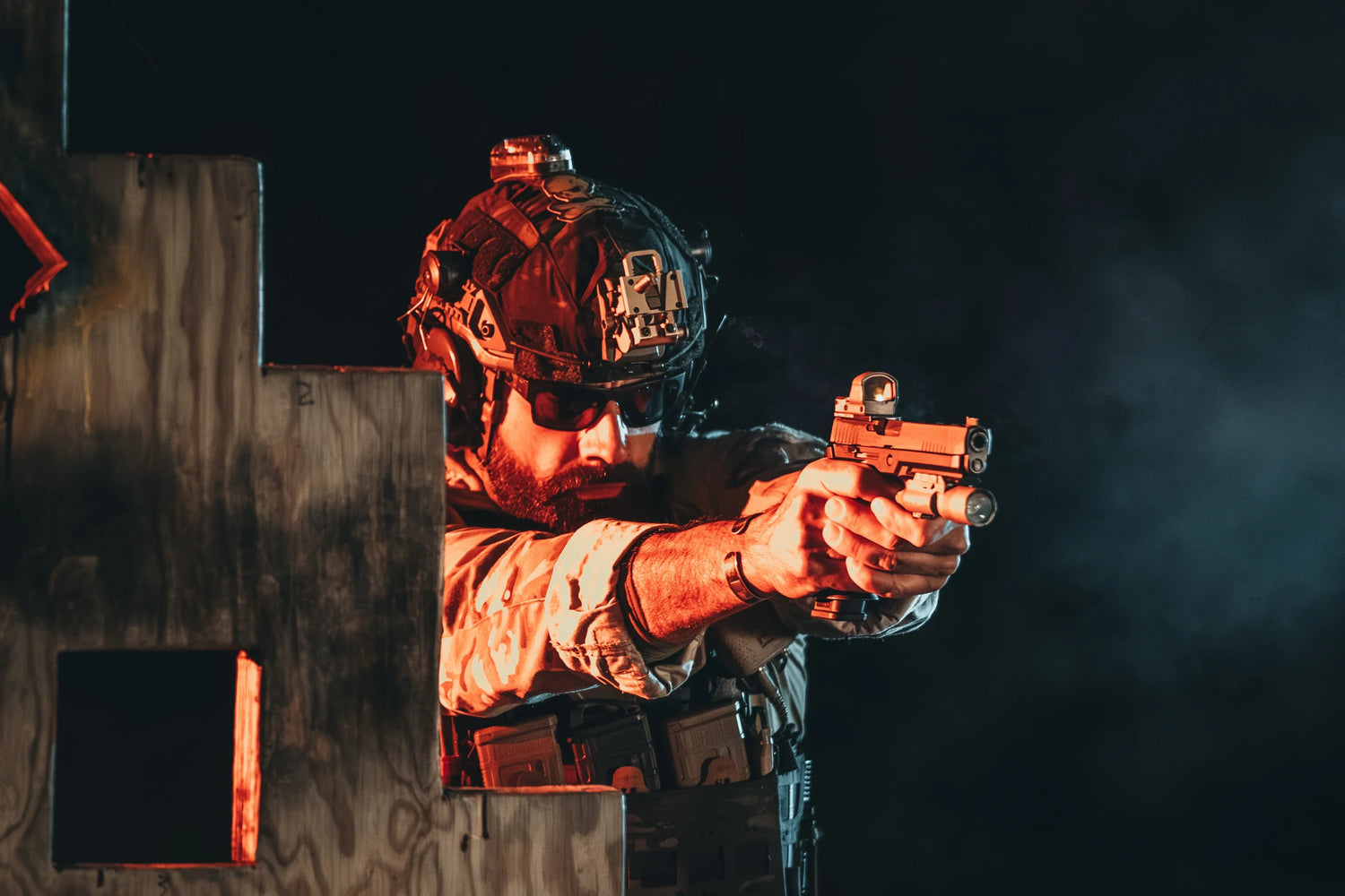 Dterminde looking soldier holding a weapon and aiming.