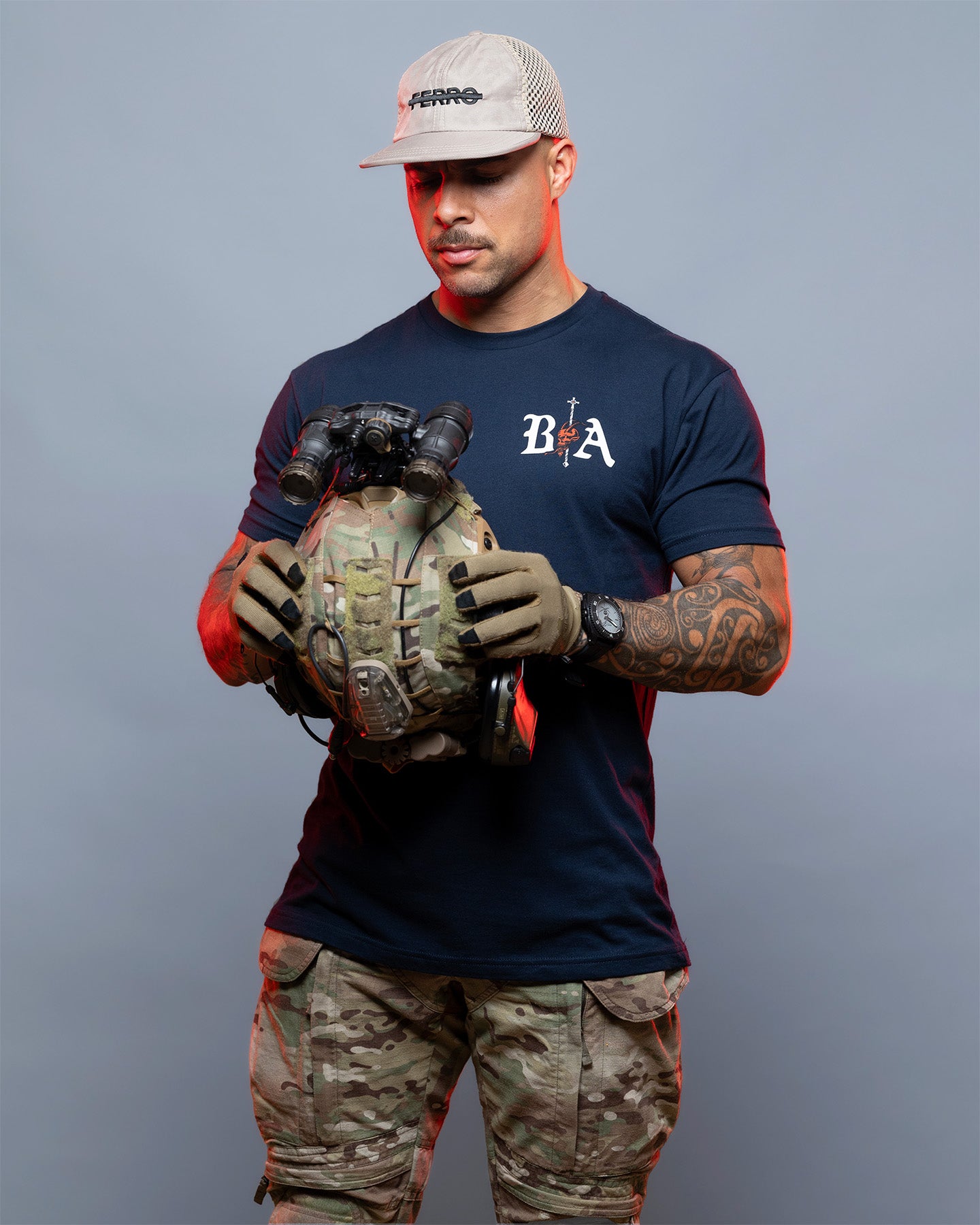 Person holding a grenade with tactical gear on a gray background. #color_navy