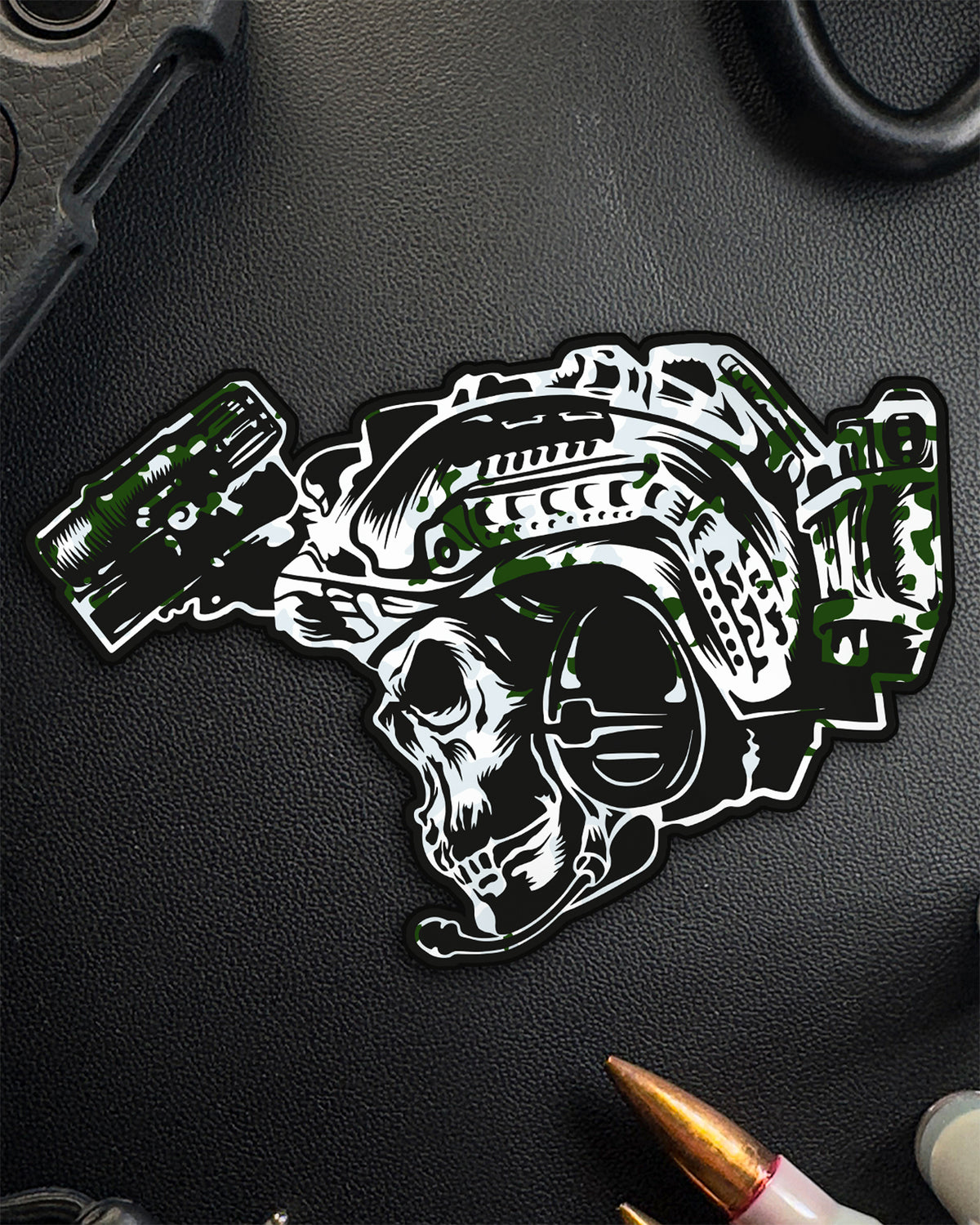 BIA skull sticker in Schneetarn snow camo on a dark surface