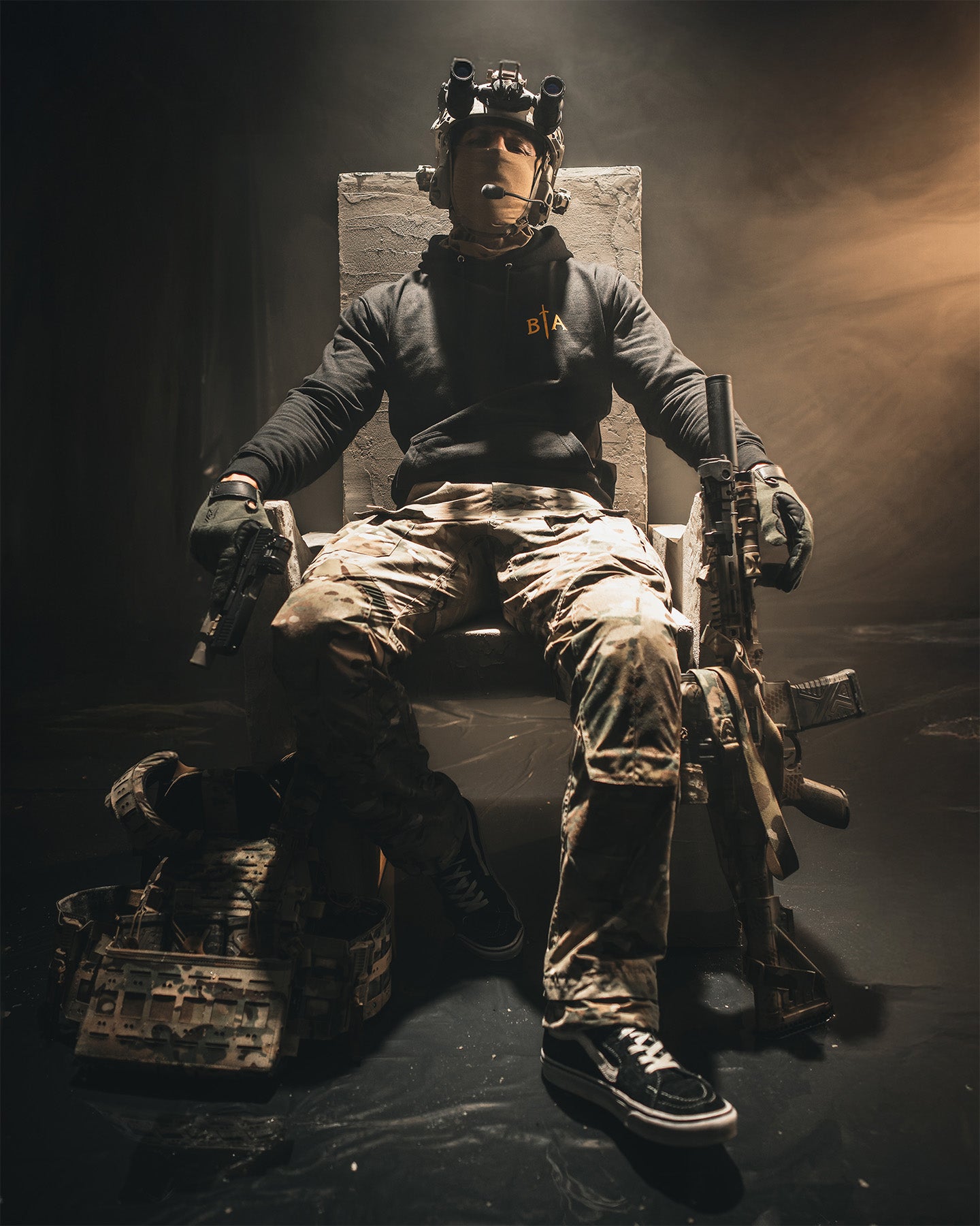 Person in futuristic military attire sitting on a chair with a dark background. #color_black #in_field