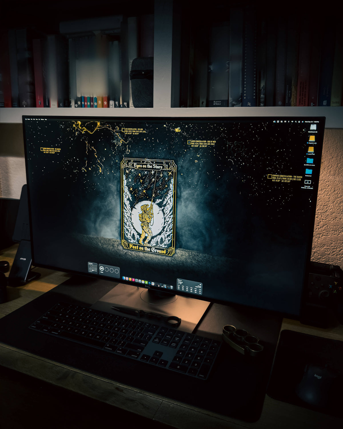Monitor showing a gold and dark wallpaper from the Command collection