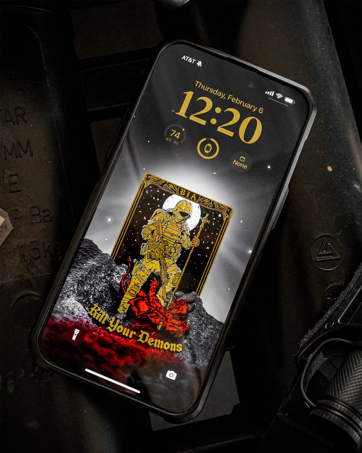 Phone displaying a gold tarot wallpaper from the Discipline collection