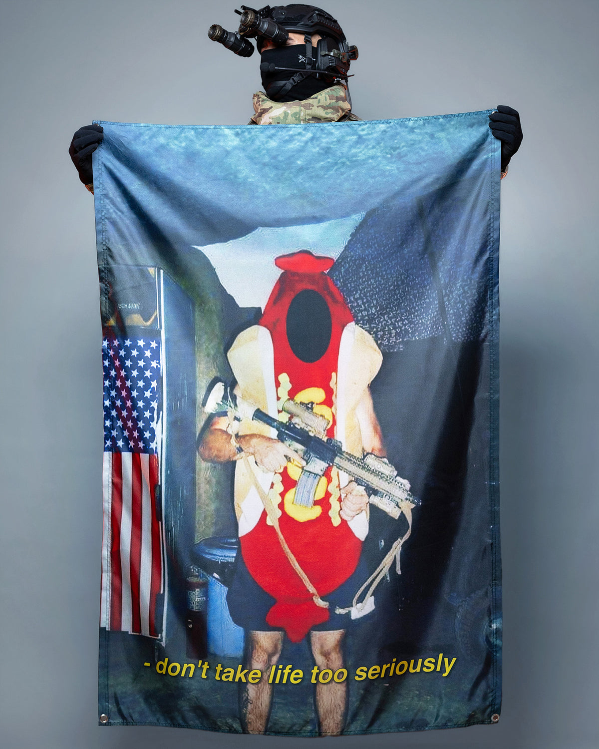 Seriously flag held open, showing the pin-up style artwork with US flags