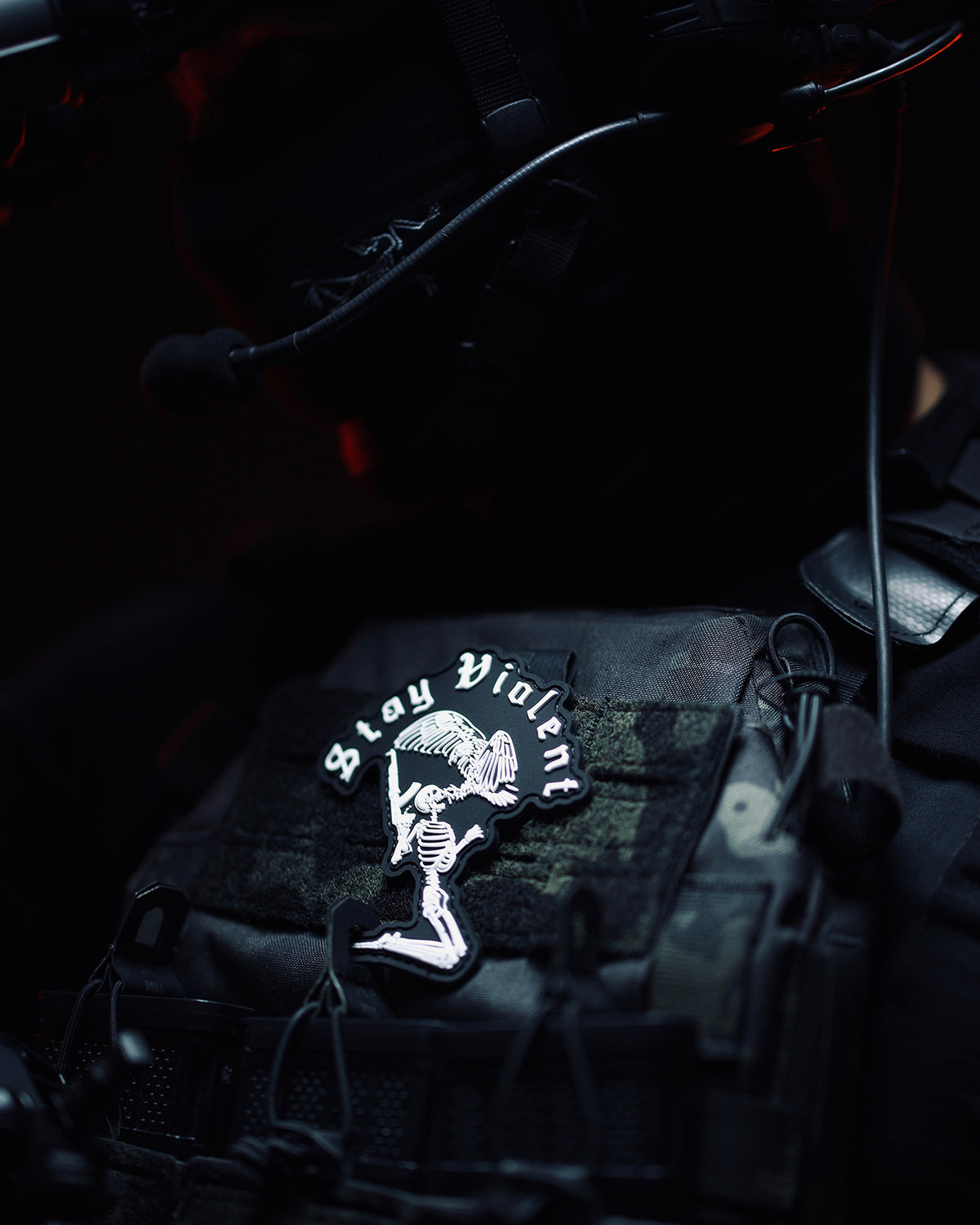 Stay Violent 3D patch glowing on kit in the dark