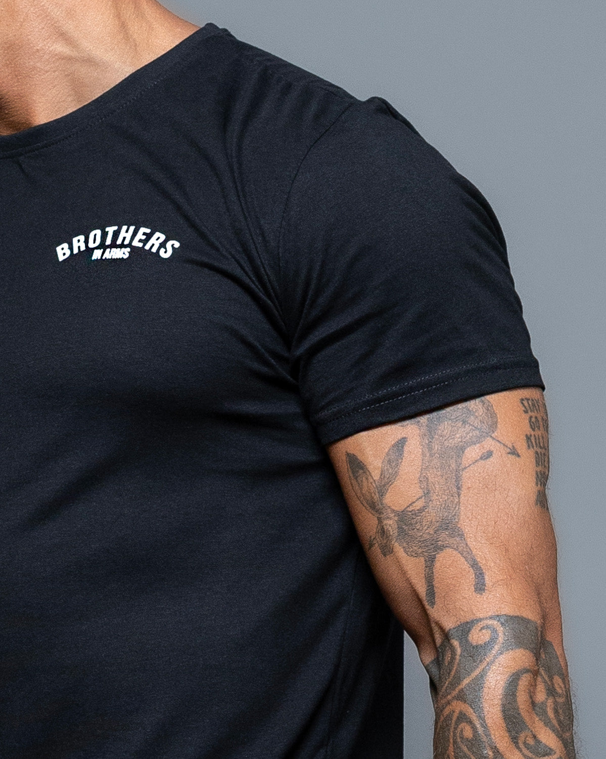 Close-up of the Brothers in Arms chest print on the black Team T-Shirt