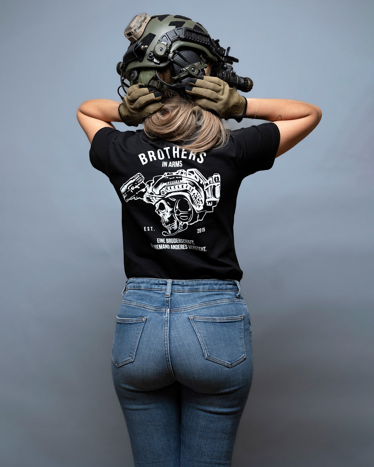 Close-up from behind of the black Team Women's Shirt with the full back print
