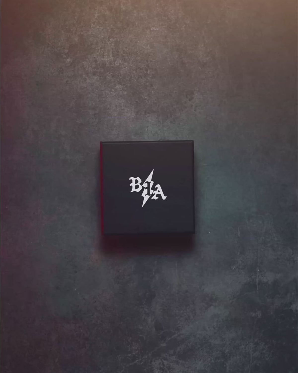 Product video of the black Bolt Pouch Can with the B|A logo on the lid, shot in studio and in the field